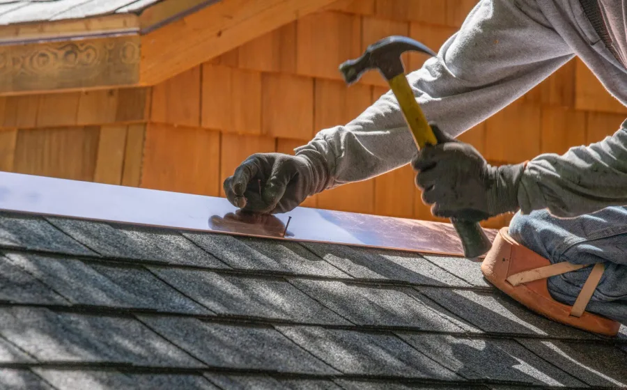 A genuine D.J.K Roofcare job — our team working on a pitched roof